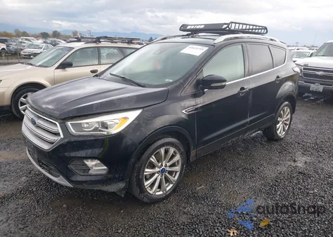 2018 Ford Escape Titanium z USA, uszkodzony, nr VIN 1FMCU9J91JUB09866